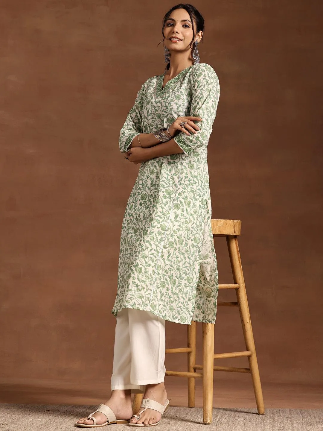 1_8cfb8b91-45df-4b09-aafd-c31079d7315b.webp Green Printed Cotton Straight Kurta - Image 1